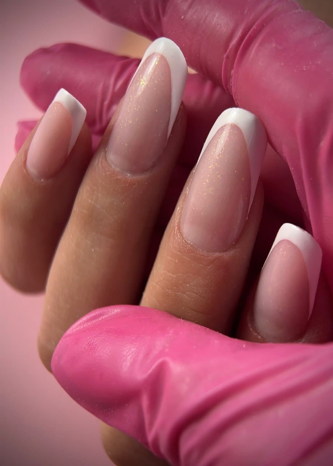 Soft pink French-style nails